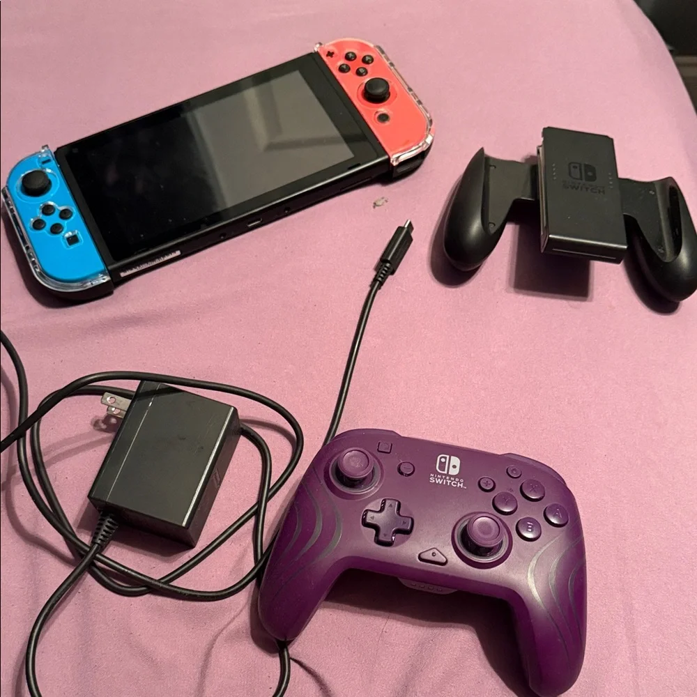 Nintendo Switch with Red, Blue Joy-Con and Purple Controller